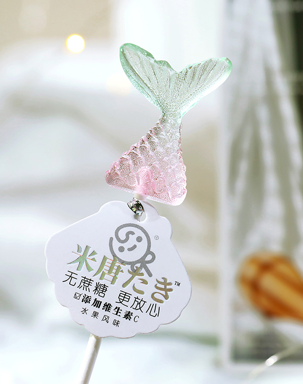 米唐たき海洋小分隊(duì)棒棒糖-魚(yú)尾漸變白桃味.jpg